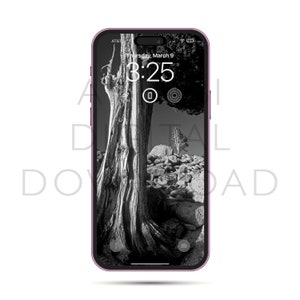 May include: A black and white photograph of a tree and rocks on a phone screen. The phone is purple and has a black screen with the time 3:25 displayed. The date is Thursday, March 9.