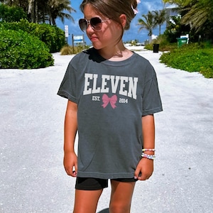 Coquette Bow Eleventh Birthday Shirt, University Style Girls Birthday Party Tee, 11 Year Old Birthday Gift, Year Est., 11th B-Day
