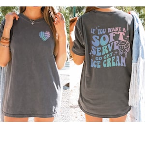 May include: A gray t-shirt with a volleyball graphic on the front and the text "If you want a soft serve go get ice cream" on the back.