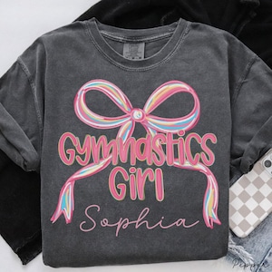 Camiseta personalizada de gimnasia para niña, con lazo coqueto, regalo para gimnasta, regalo para el encuentro del equipo de gimnasia, colores cómodos.