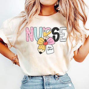Personalized School Nurse Shirt, School Nurse Coquette Notebook Bow Tee, Custom School Nurse Gift, Back to School Nurse T-Shirt