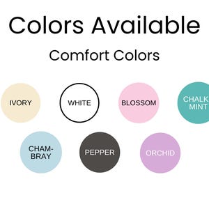 May include: Image displaying a color palette labeled "Colors Available" and "Comfort Colors." The palette includes Ivory, White, Blossom, Chalky Mint, Chambray, Pepper, and Orchid. The Foxy Finds logo is in the bottom right corner.