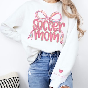 Personalized Soccer Mom Preppy Coquette Bow Sweatshirt, Custom Soccer Mama Sleeve Name, Game Day Sweatshirt, Gift for Soccer Mom
