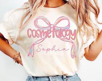 Cosmetologist Shirt, Cosmetology Coquette Bow Personalized Name Tee, Cosmetology School Graduation Gift, Hairstylist, Makeup Artist