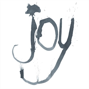 May include: The word JOY is written in a dark gray, ink-wash style font. The letters feature a hand-painted aesthetic with visible brush strokes, ink splatters, and a textured, uneven appearance that gives the text a fluid, artistic quality.