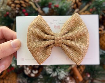 Festive gold glitter hair bow, Christmas hair bow,  sparkly gold Christmas hairband, baby Christmas bow, New Year’s Eve hair bow