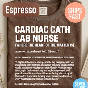 May include: Espresso-colored t-shirt with the text "CARDIAC CATH LAB NURSE" in white. The shirt includes a definition and description of the role. The shirt also has the text "SHIPS FAST" and "SEVEN COLORS".