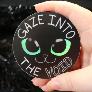 Gaze into the VOID 3" holographic vinyl sticker