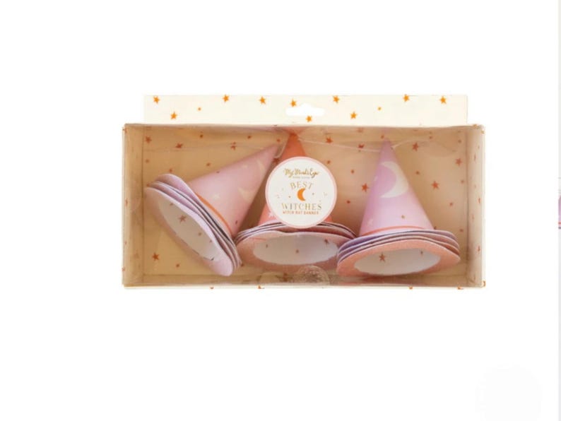 May include: A set of three pink and purple witch hats with gold stars and a crescent moon design. The hats are packaged in a box with a gold star pattern and the text "My Melody Best Witches with our smiles".