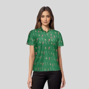 Waist-up view of a model wearing the green Christmas pattern golf polo shirt.