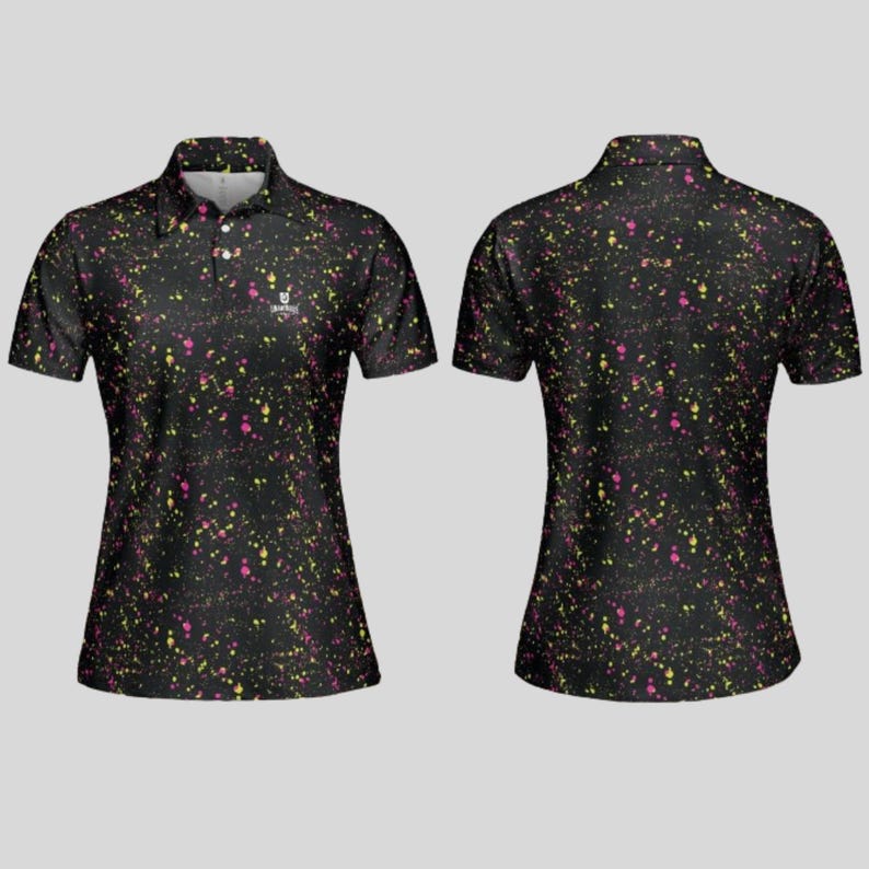 Front and back view of the black paint splatter polo shirt on a grey background.
