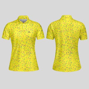Front and back views of the yellow sprinkle-patterned women's golf polo shirt.