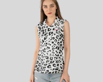 Polo feminina sem mangas Snow Leopard para golfe, blusa esportiva leve com tecnologia de absorção de umidade.