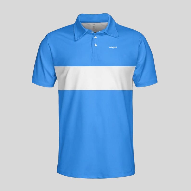 Flat front view of a powder blue men's golf polo with a wide white chest stripe, three-button placket and small white Unanimous Golf logo.