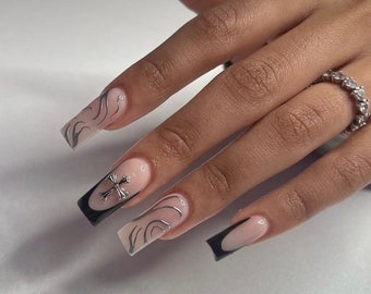 0A059 | silver chrome swirls, black French tip nail glue included, cross gem long tapered square press on nail glue incld