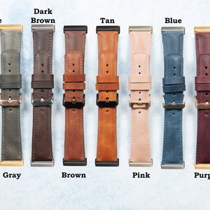 May include: A collection of leather watch bands in various colors, including anthracite, gray, dark brown, brown, tan, pink, blue, purple, and green. Each band features a buckle and is displayed against a light background.