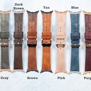 May include: A collection of leather watch bands in various colors, including anthracite, dark brown, tan, blue, green, gray, brown, pink, and purple. Each band features a buckle and is designed for a smartwatch.