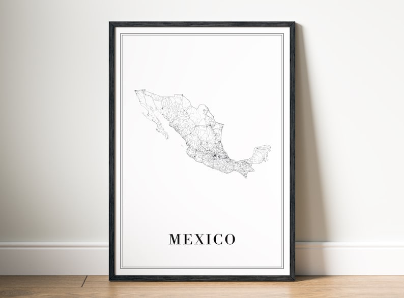 May include: A framed print featuring a detailed black and white map of Mexico. The country's outline is filled with a network of lines representing roads and cities. The word "MEXICO" is printed in a clean, sans-serif font below the map.
