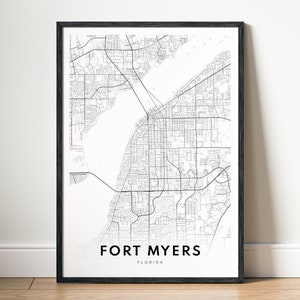May include: Black and white map print of Fort Myers, Florida, with a black frame.