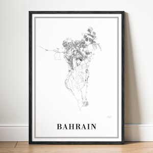May include: A framed black and white map of Bahrain. The map is a detailed line drawing of the country's outline and internal features. The word "BAHRAIN" is printed in a bold, sans-serif font at the bottom of the print.