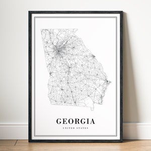 Könnte beinhalten: Schwarz-weiß-Linienkunst-Druck des Bundesstaates Georgia, Vereinigte Staaten. Der Druck zeigt die Straßen und Autobahnen des Bundesstaates. Der Druck ist in einem schwarzen Rahmen gerahmt.