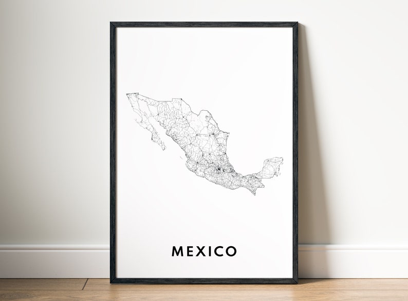 May include: A framed print featuring a detailed black and white map of Mexico. The map highlights roads and geographical features. The word "MEXICO" is printed in a bold, black font at the bottom of the print.