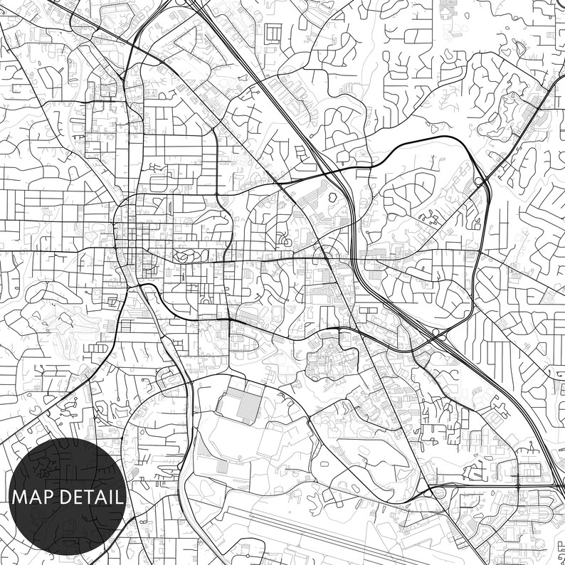 May include: Black and white street map of a city with a large airport in the lower right corner. The map shows a detailed network of roads and streets.