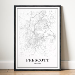 Op de afbeelding: Zwart-witte kaartprint van Prescott, Arizona, in een zwart frame. De kaart toont de straten en wegen van de stad.