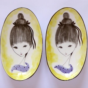 A Pair of Ceramica di Milano wall plates  / Please contact for shipping costs