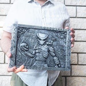 Predator Yautja movie monster carving, in 3D metal effect. Poster art as 3d sign. Space decor from bio-degradable polymer.