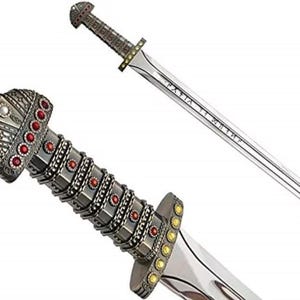May include: A silver-toned sword featuring a highly detailed hilt adorned with numerous small red circular inlays and a pommel with white accents. The crossguard is decorated with yellow circular inlays, and the blade displays engraved runic text.
