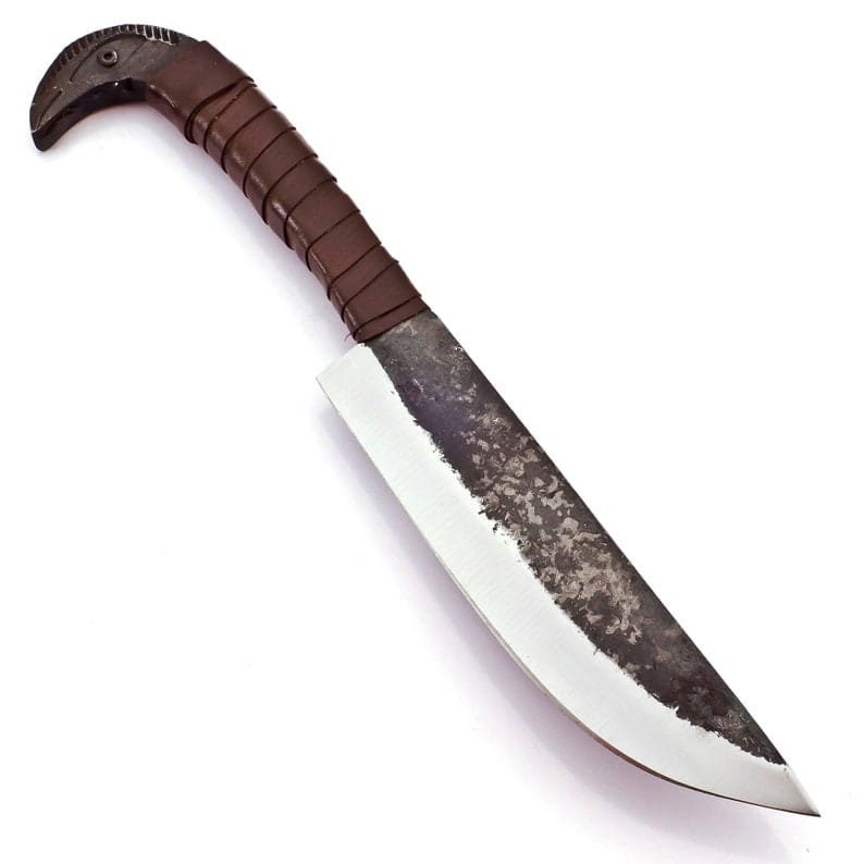 May include: A handcrafted knife with a bird-shaped handle. The handle is wrapped in brown leather. The blade is made of metal with a silver edge and a dark, textured finish. The knife is designed for cutting.