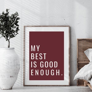 Może przedstawiać: Maroonowy plakat z białym tekstem, kt&oacute;ry brzmi "My best is good enough."