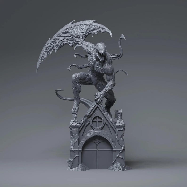 May include: A gray, detailed sculpture of a monstrous figure with a large, wing-like structure extending from its back. The figure is posed atop a gothic-style structure, with intricate details and a menacing expression.
