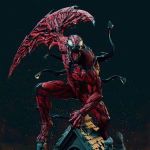 May include: A red and black Carnage statue in a crouching pose, with a detailed muscular physique and large wing-like structures extending from its back. The figure is perched atop a building, with a dark background.