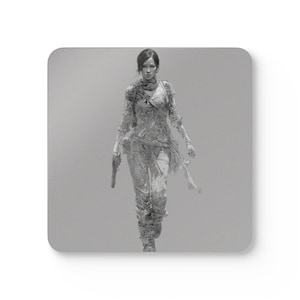 May include: A monochrome image of a woman in a detailed, textured outfit, holding a gun. She is walking forward, with a scarf around her neck and a flowing piece of fabric. The background is a solid, light grey.