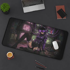 May include: A rectangular desk mat featuring a dark, cyberpunk-inspired illustration of a character wearing a purple jacket, black skirt, and futuristic visor with glowing purple cables connected to multiple vintage computer monitors in the background.