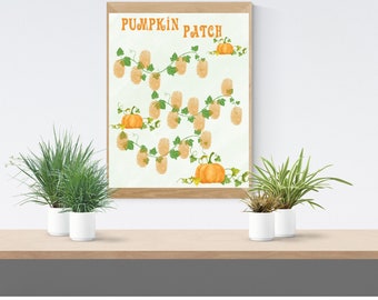 May include: A framed wall art print titled PUMPKIN PATCH featuring orange pumpkins and green vines with numerous light tan fingerprint-style marks arranged along the stems against a pale green background in a light wood frame.
