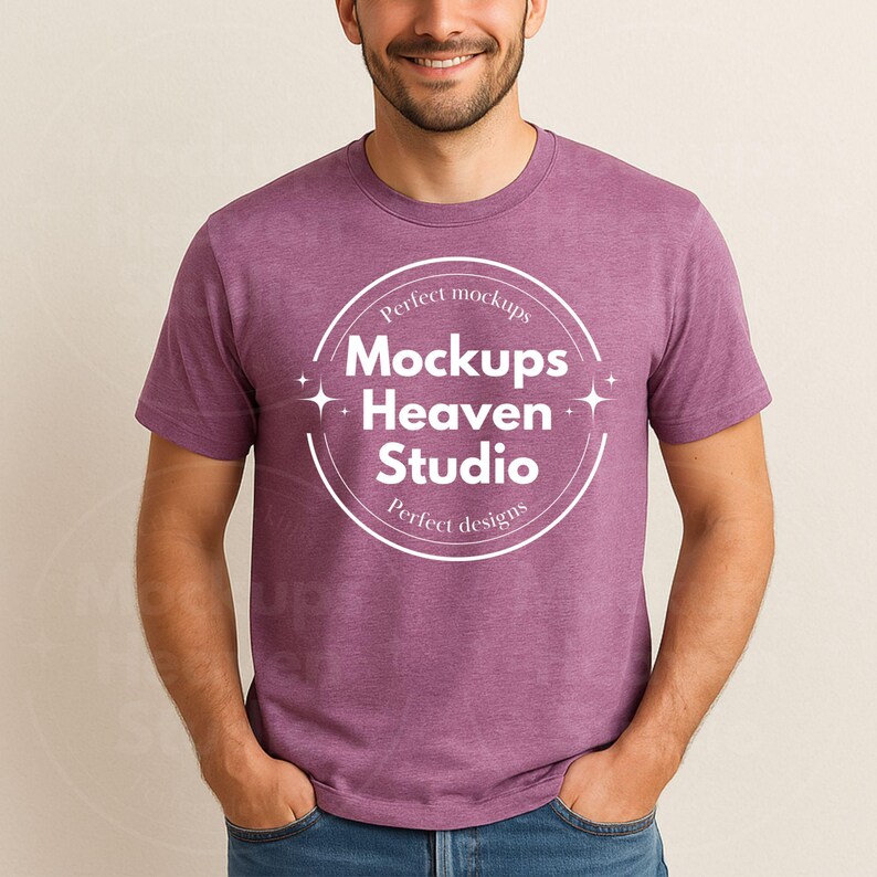 May include: A short-sleeved, heathered purple t-shirt. The shirt features a white circular graphic with the text "Perfect mockups Mockups Heaven Studio Perfect designs". The person is wearing blue jeans.