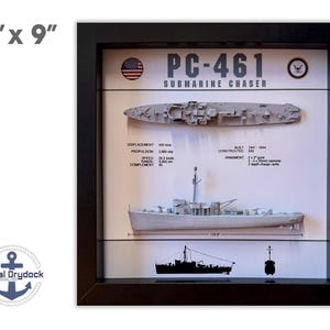 May include: A framed 9" x 9" print of a model of the PC-461 Submarine Chaser. The print includes a side view of the ship, a top view, and a silhouette of the ship. The print also includes text about the ship's specifications, including its displacement, propulsion, speed, range, and armament.