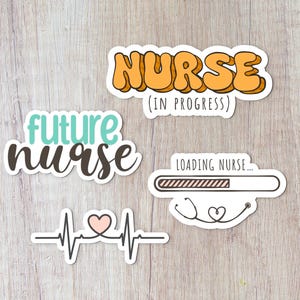 May include: Four stickers with different designs related to nursing. The first sticker says "future nurse" in teal and black lettering. The second sticker says "NURSE (IN PROGRESS)" in orange bubble letters. The third sticker says "LOADING NURSE..." with a progress bar and a stethoscope. The fourth sticker is a heartbeat line with a pink heart in the middle.
