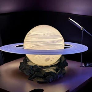Planet lamp with color changing battery powered LEDs. Free base included!