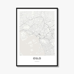 May include: A framed wall art print featuring a detailed street map of Oslo, Norway. The map displays light gray roads and water features against a pale background. The text OSLO and NORWAY is printed in a bold, black sans-serif font at the bottom.