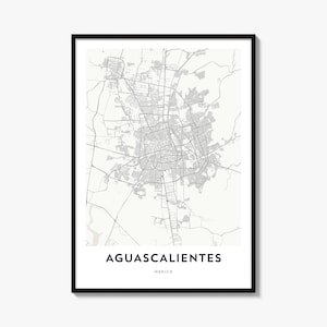 May include: A framed wall art print featuring a light grey street map of Aguascalientes, Mexico, on a white background. The text AGUASCALIENTES is printed in bold black capital letters at the bottom, followed by the word MEXICO in smaller text.