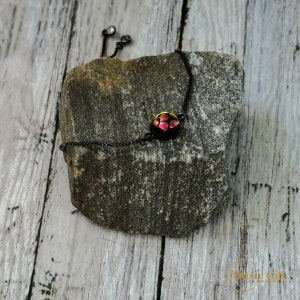 Black Slider Bracelet with Small Metallic Pink Ladybug Fused Glass Cabochon
