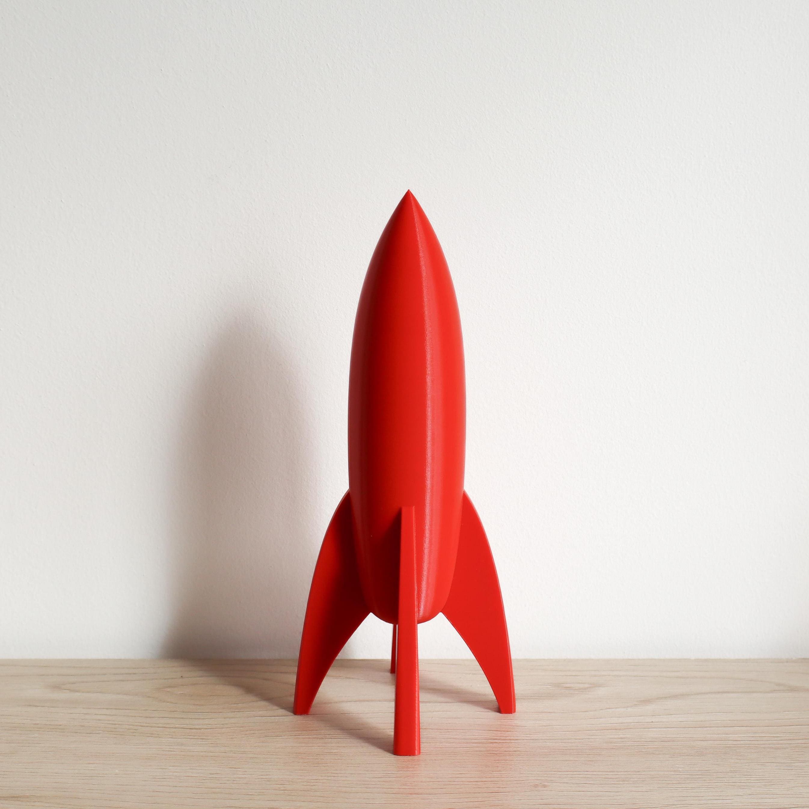 置物 60s vintage art deco rocket object deco-rocket-ascends-stockcake.jpg