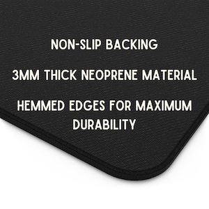 May include: Black non-slip mouse pad with white text that reads "NON-SLIP BACKING", "3MM THICK NEOPRENE MATERIAL", and "HEMMED EDGES FOR MAXIMUM DURABILITY".