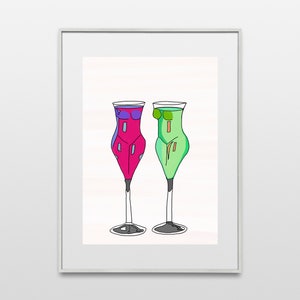 May include: A framed art print depicting two cocktail glasses with human-like forms. One glass is filled with magenta liquid, the other with green. Both have black outlines and are set against a white background.