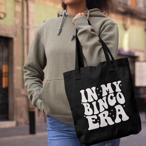 In my Bingo Era Cotton Canvas Tote Bag for the Bingo Lover to carry their bingo gear in or just their groceries!