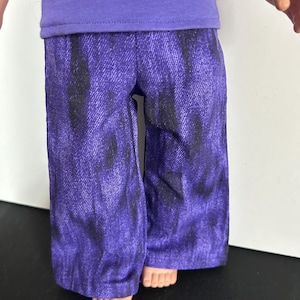 Purple and black jeans with wide legs for 18 inch dolls.